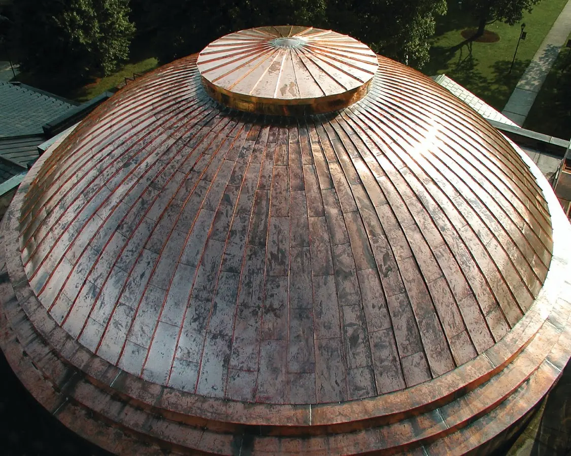 Craftsman Roofing crew installing a new roof in Dorr